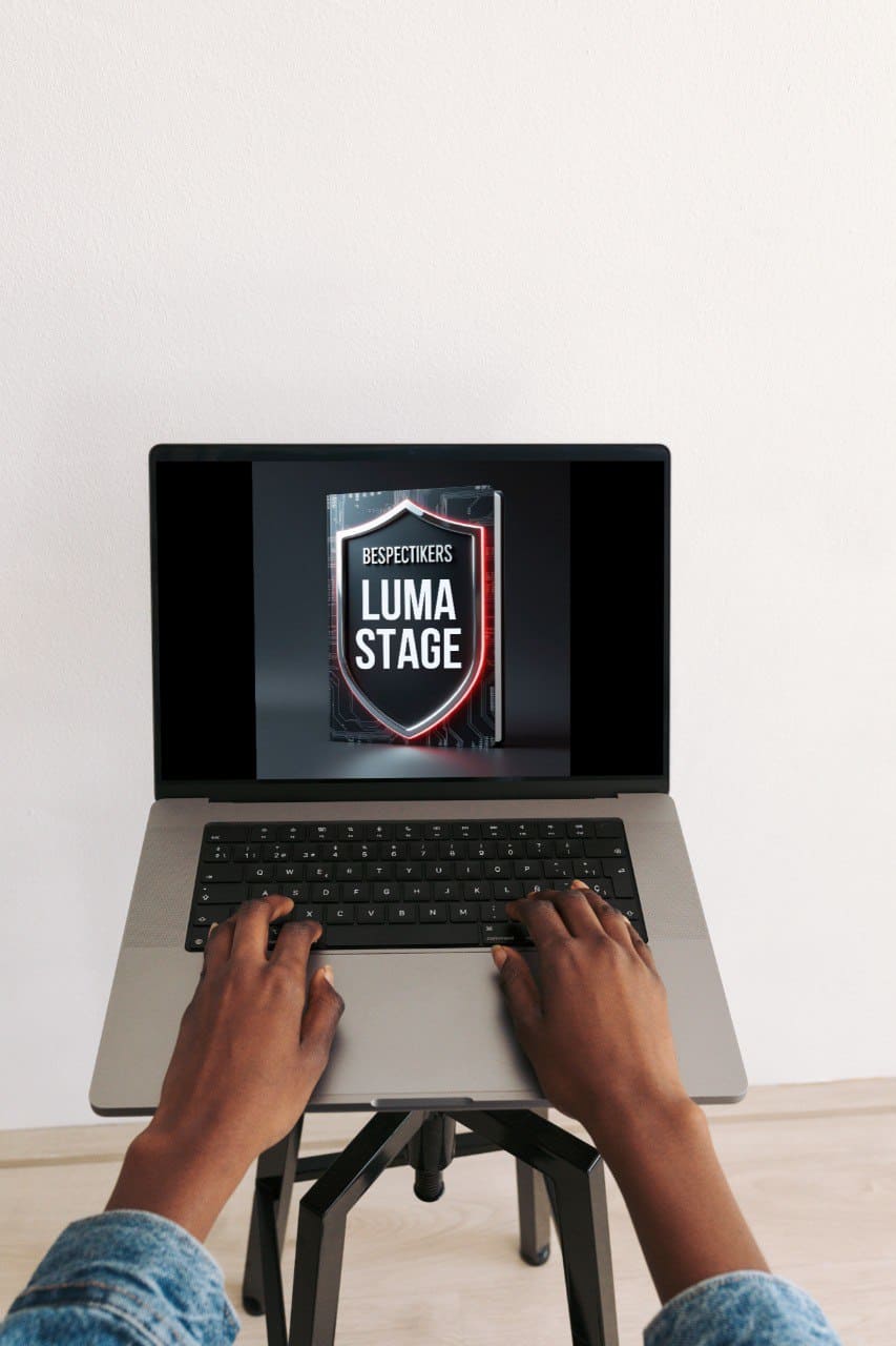 person holding Laptop where course cover says "Luma Stage"