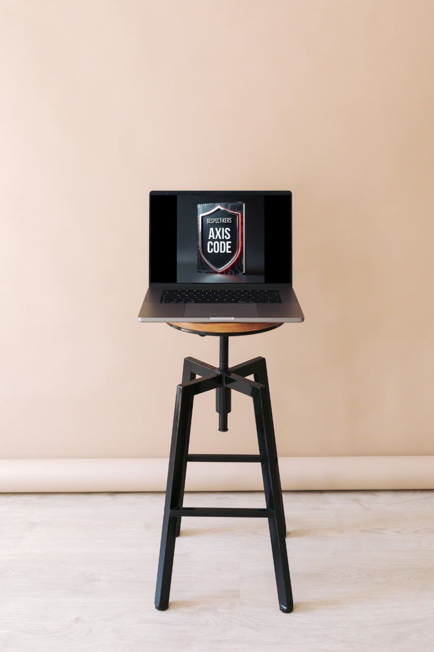 Laptop where course cover says "Axis code"